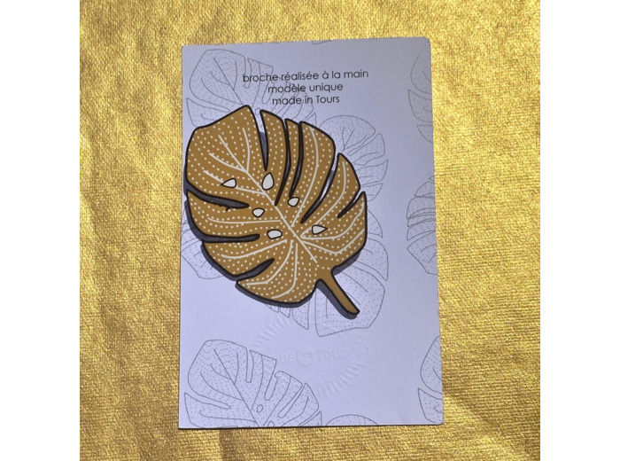 Broche monstera fond jaune dessin blanc