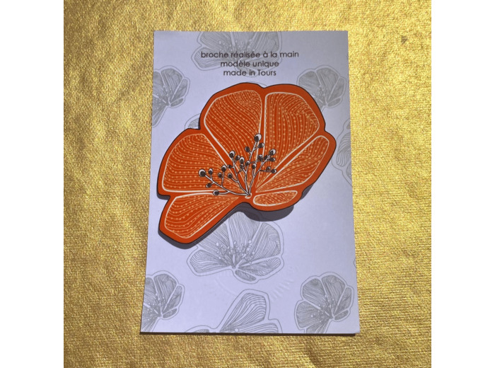 Broche demi-fleur fond orange pois blancs pistils pailletés argent