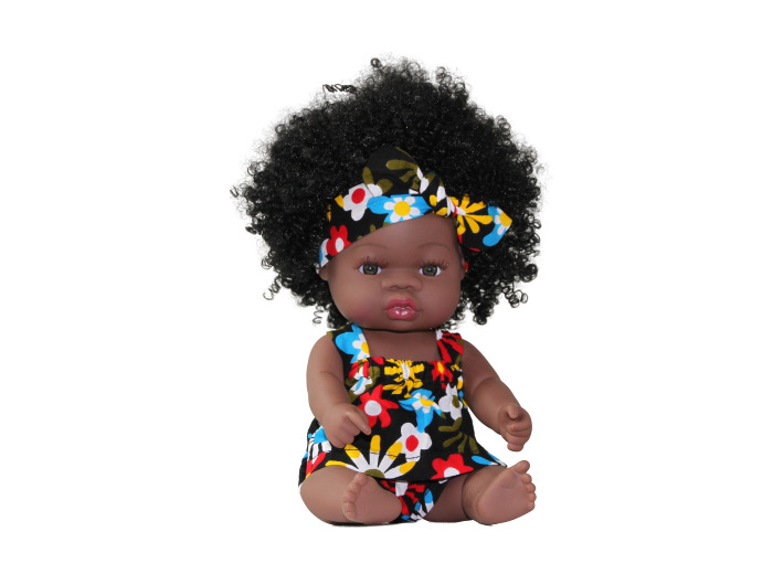 POUPEE AFRO ANTILLAISE ALMA BOHEME AUX CHEVEUX NOIRS FRISES