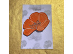 Broche demi-fleur fond orange pois blancs pistils pailletés argent