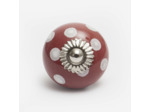 Bouton en céramique rouge à pois blancs