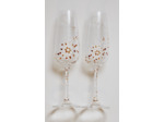 Duo de flutes en cristal peintes à la main et personnalisables représentant une envolée de pétales de fleurs dans le vent