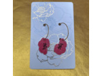 Boucles d'oreilles créoles demi-fleurs asymétriques roses petit format