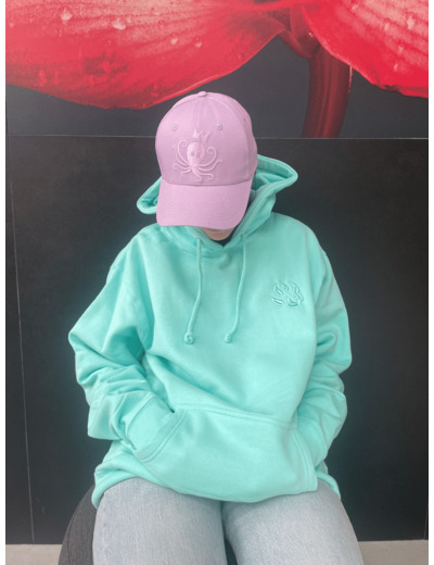 Sweat à capuche turquoise logo "petite patte de chien" collection été 2024